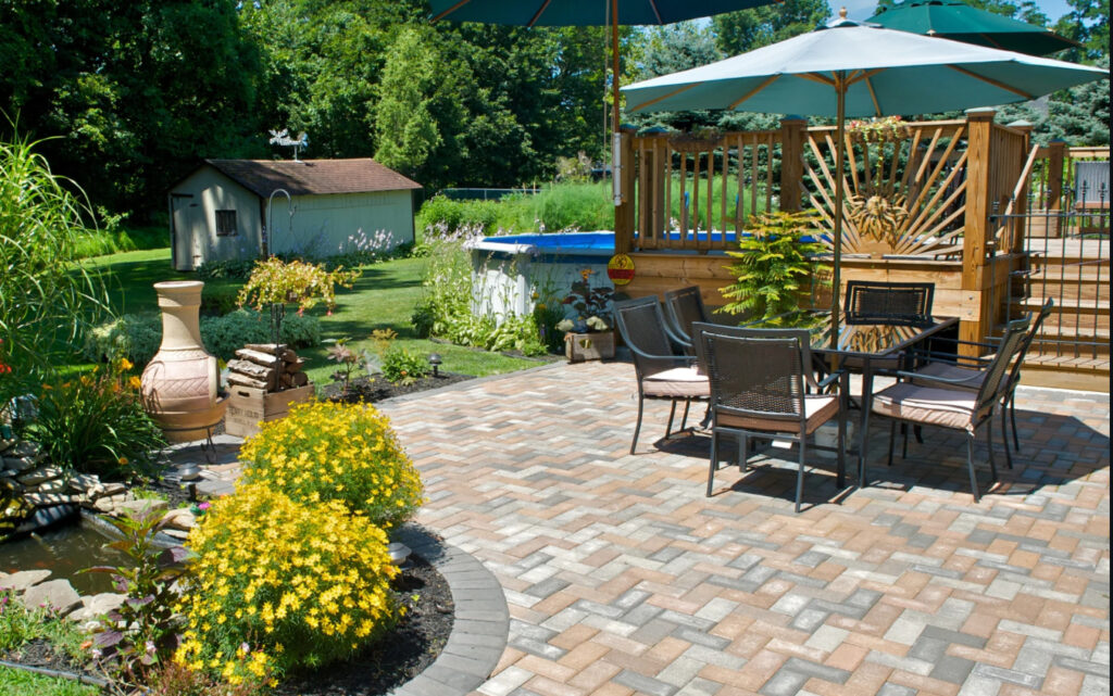 Stone walkway and retaining wall in professionally landscaped Garden